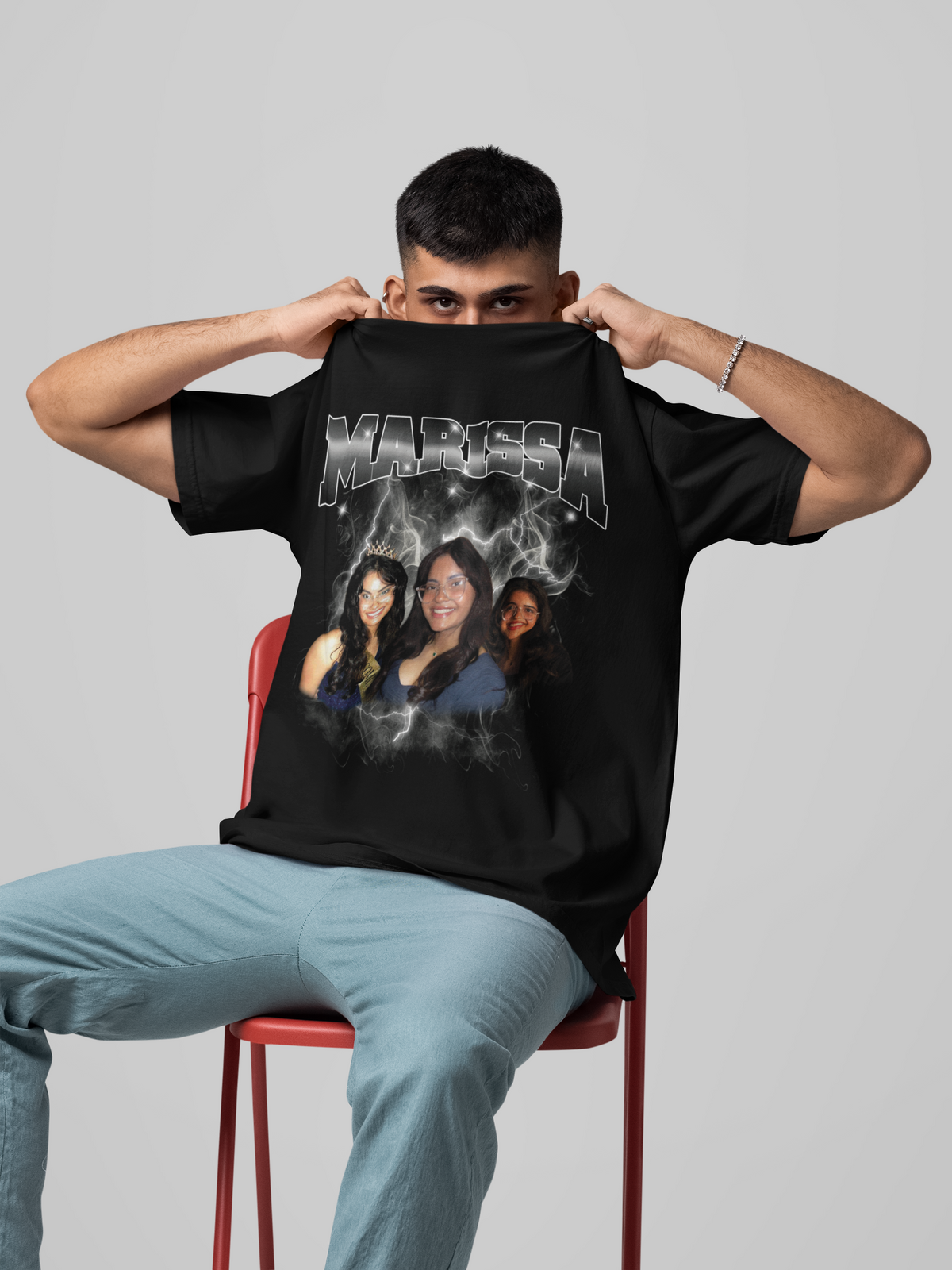 Man wearing personalized retro lightning custom T-shirt in studio setting