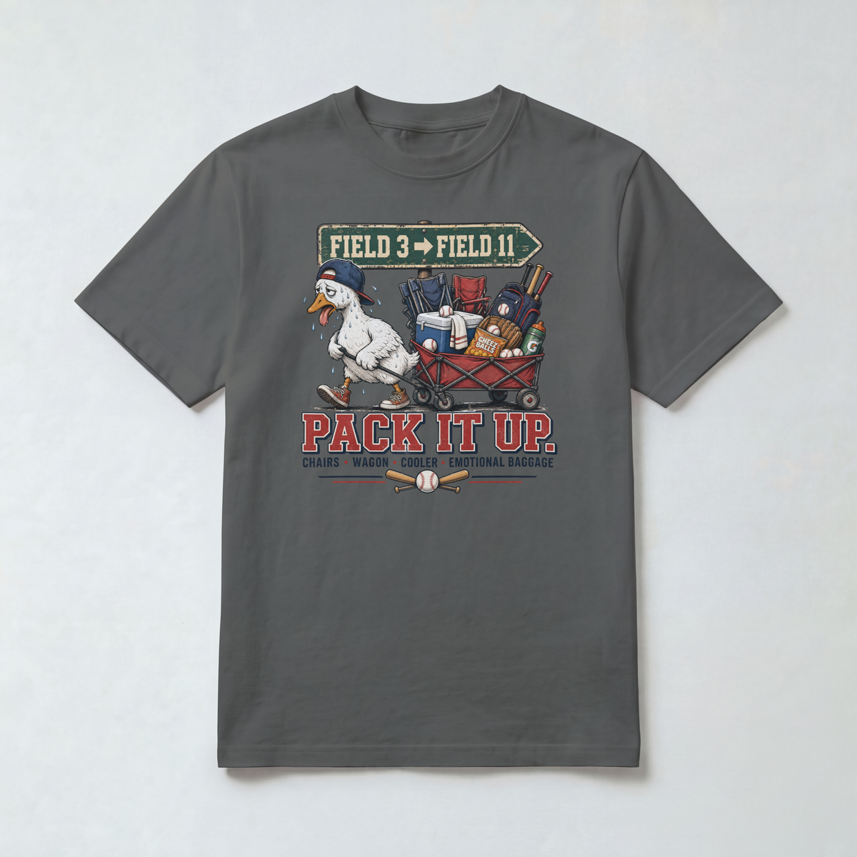 Pepper Comfort Colors 1717 travel baseball parent shirt with goose pulling a tournament gear wagon and Pack It Up graphic.