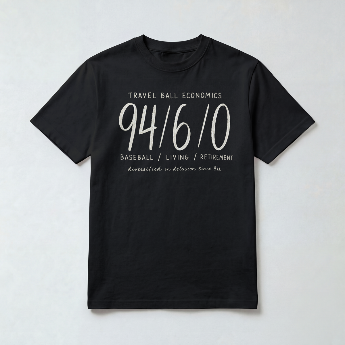 Black Comfort Colors 1717 travel baseball shirt with ivory chalk-style 94/6/0 graphic, designed as a funny baseball mom or dad shirt.
