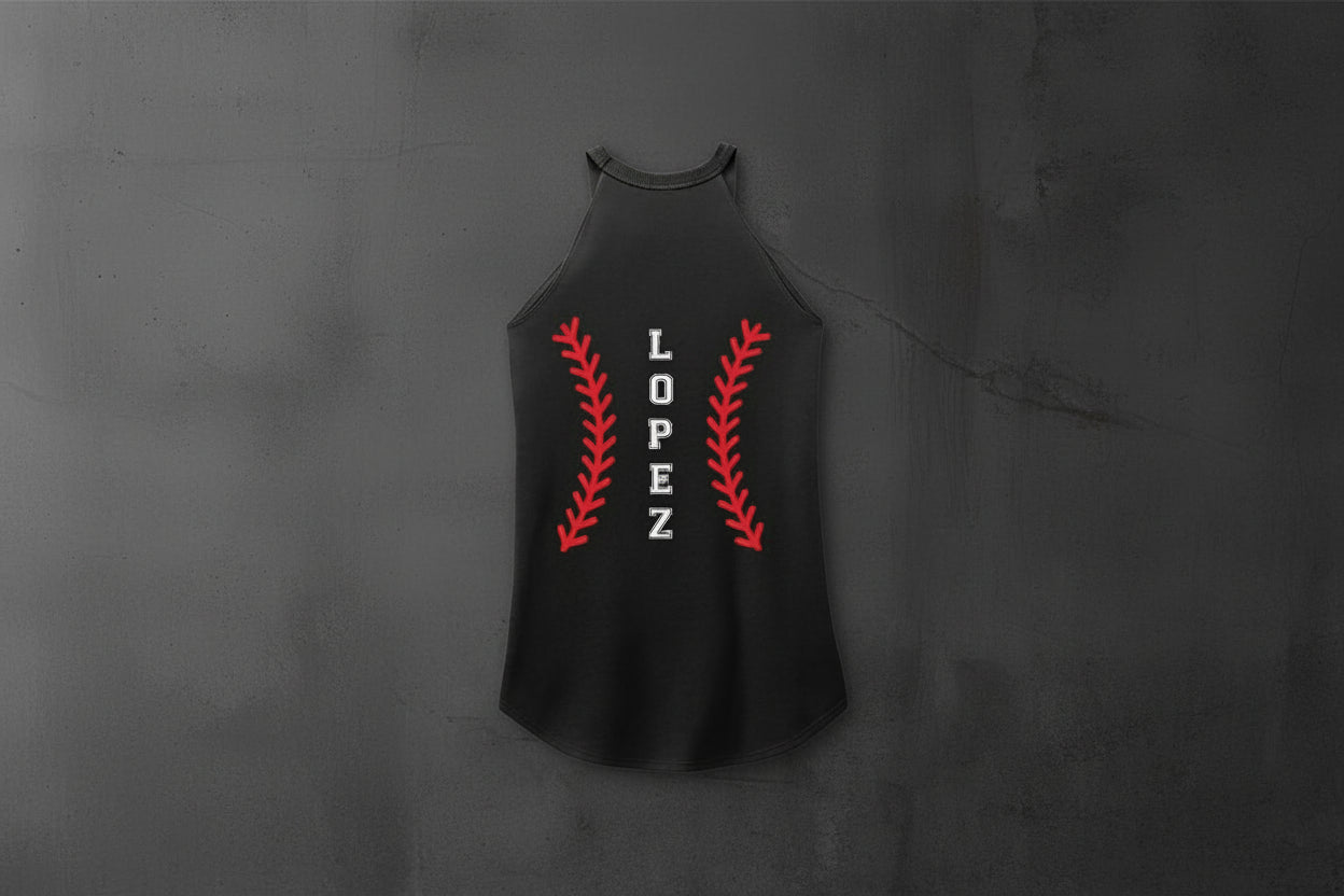 Black personalized baseball tank top back view mockup with custom player name Lopez and red softball stitching design on a gray concrete wall background